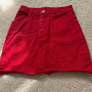 Red denim mini skirt.